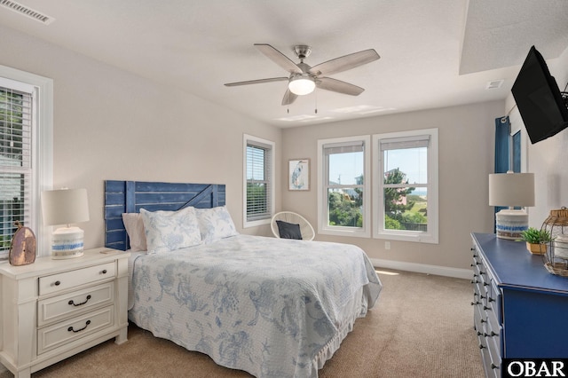 5009 Lindbergh Ave Lot 28, Kitty Hawk, NC 27949 - bedroom featuring light carpet and ceiling fan