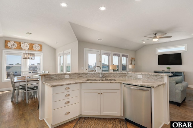 5009 Lindbergh Ave Lot 28, Kitty Hawk, NC 27949 - kitchen featuring stainless steel dishwasher, vaulted ceiling, open floor plan, wood finished floors, and a ceiling fan