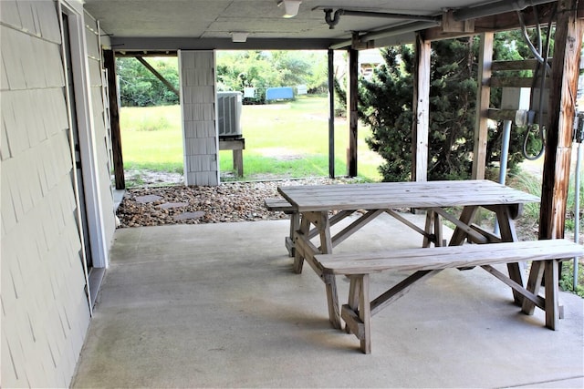 view of patio / terrace featuring central air condition unit and outdoor dining area