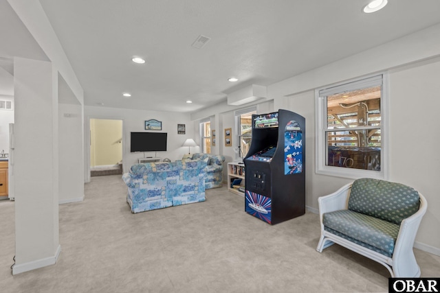 living room with baseboards, carpet flooring, visible vents, and recessed lighting