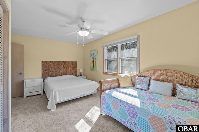 bedroom featuring carpet and a ceiling fan