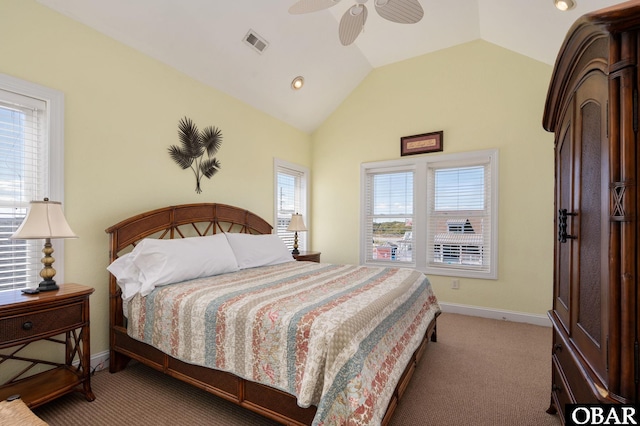 carpeted bedroom featuring vaulted ceiling, a ceiling fan, visible vents, and baseboards