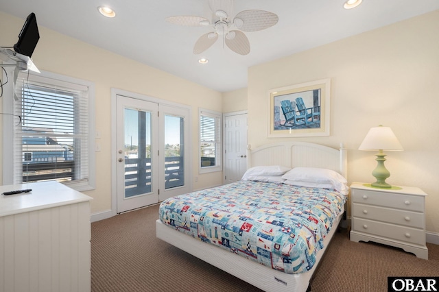 carpeted bedroom with multiple windows, baseboards, recessed lighting, and access to exterior