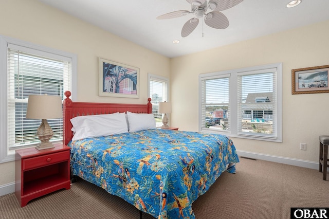carpeted bedroom with recessed lighting, visible vents, and baseboards