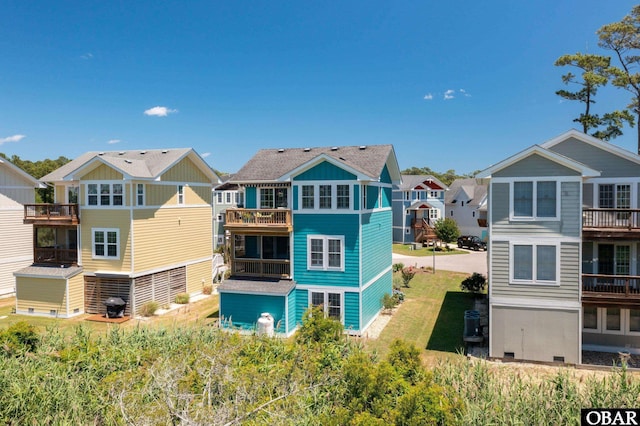 100 Amherst Dr Unit 3, Kill Devil Hills, NC 27948 - back of house featuring a residential view and a balcony
