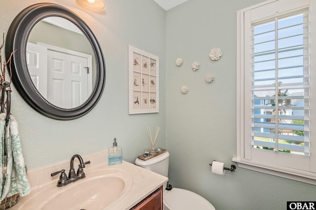 100 Amherst Dr Unit 3, Kill Devil Hills, NC 27948 - half bathroom with plenty of natural light, toilet, and vanity