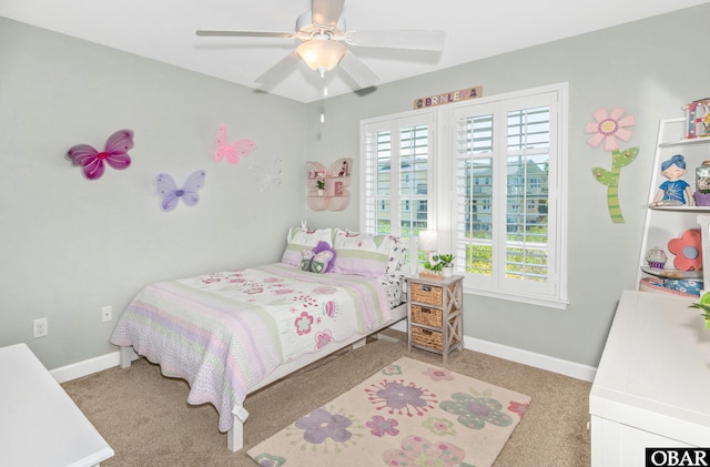 100 Amherst Dr Unit 3, Kill Devil Hills, NC 27948 - bedroom with multiple windows, carpet flooring, baseboards, and a ceiling fan