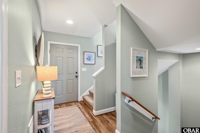 100 Amherst Dr Unit 3, Kill Devil Hills, NC 27948 - entrance foyer featuring wood finished floors, baseboards, a textured wall, recessed lighting, and stairs