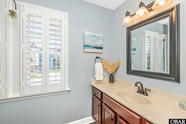 100 Amherst Dr Unit 3, Kill Devil Hills, NC 27948 - bathroom featuring vanity and baseboards
