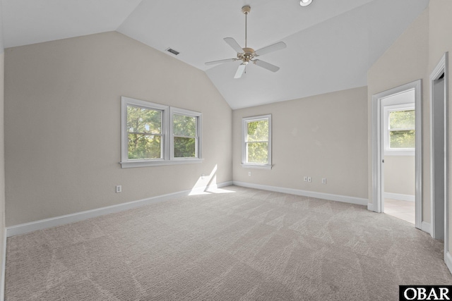 604 W First St Lot 321, Kill Devil Hills, NC 27948 - unfurnished bedroom with vaulted ceiling, baseboards, light colored carpet, and ceiling fan