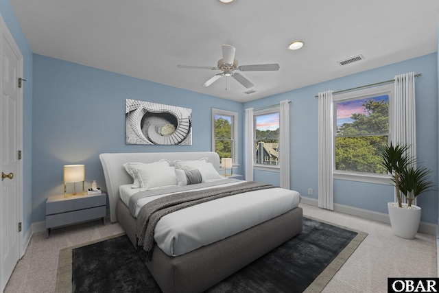 604 W First St Lot 321, Kill Devil Hills, NC 27948 - carpeted bedroom featuring baseboards and ceiling fan