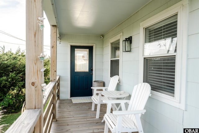 24217 N Holiday Blvd Lot 79, Rodanthe, NC 27968 - entrance to property with a porch and a security system