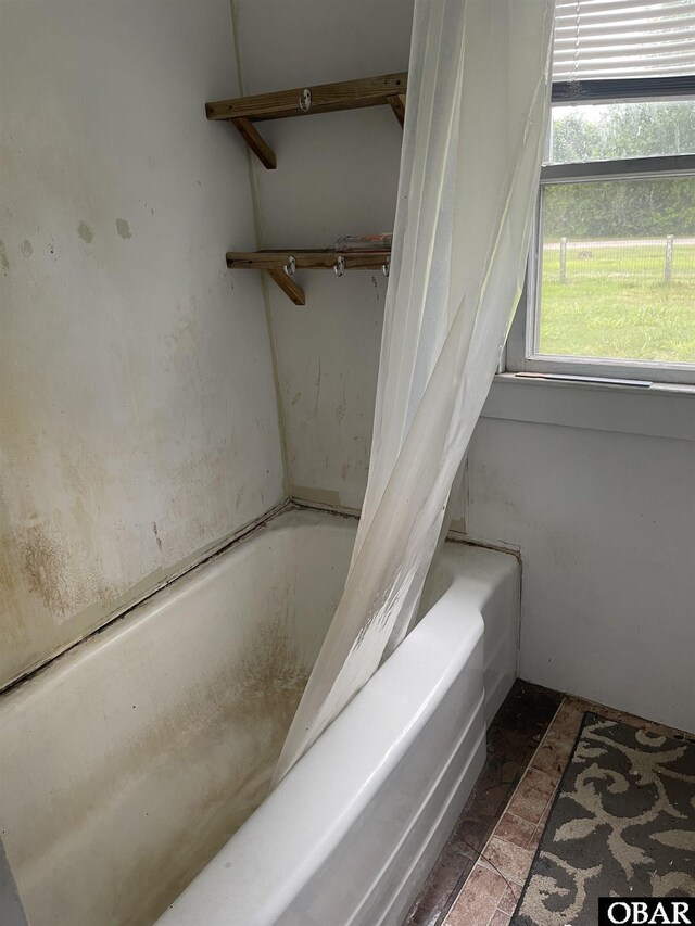 506 Poplar Branch Rd, Poplar Branch, NC 27965 - full bath featuring shower / bath combination with curtain