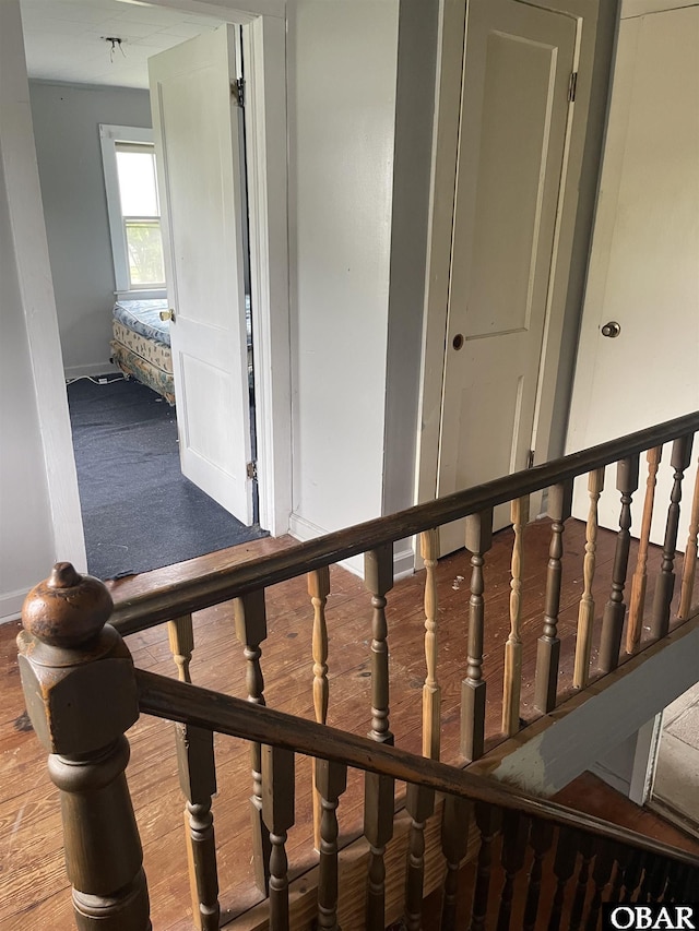 506 Poplar Branch Rd, Poplar Branch, NC 27965 - staircase featuring baseboards and carpet