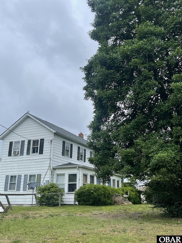 506 Poplar Branch Rd, Poplar Branch, NC 27965 - view of front of home with a chimney