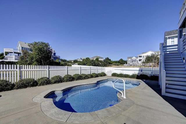 view of swimming pool featuring fence private yard, a fenced in pool, and a patio