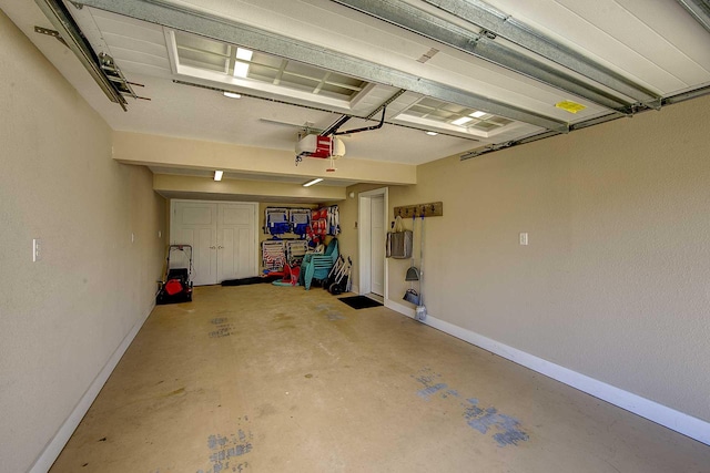 garage featuring baseboards and a garage door opener