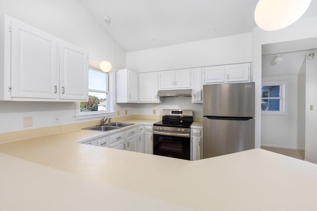 kitchen featuring a sink, stainless steel appliances, light countertops, and white cabinetry