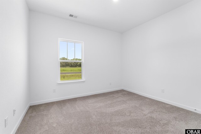 104 Yadkin Dr Lot # 77, South Mills, NC 27973 - empty room with carpet and baseboards
