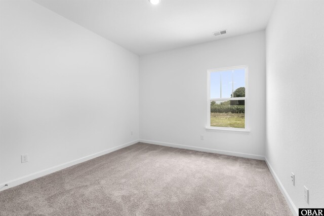 104 Yadkin Dr Lot # 77, South Mills, NC 27973 - carpeted empty room with baseboards