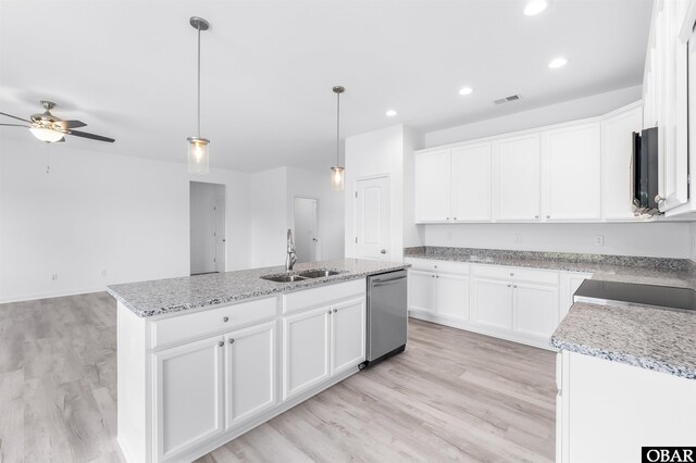 104 Yadkin Dr Lot # 77, South Mills, NC 27973 - kitchen with stainless steel dishwasher, a ceiling fan, an island with sink, white cabinetry, and recessed lighting