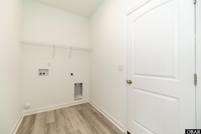 104 Yadkin Dr Lot # 77, South Mills, NC 27973 - laundry area featuring hookup for an electric dryer, light wood finished floors, and hookup for a washing machine