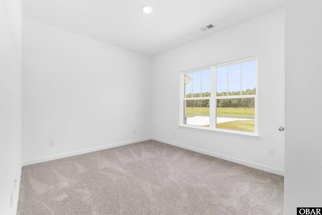 104 Yadkin Dr Lot # 77, South Mills, NC 27973 - carpeted spare room with baseboards and recessed lighting