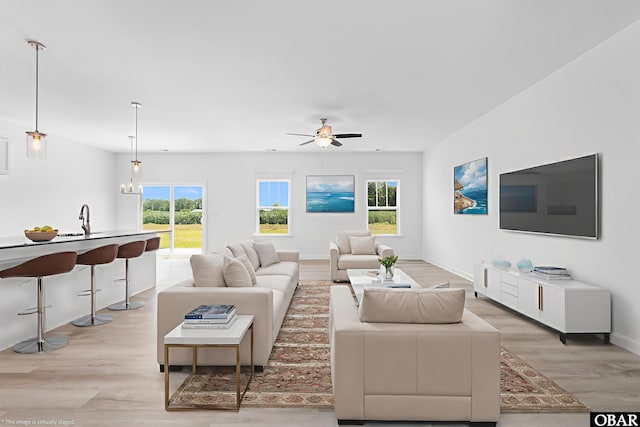 104 Yadkin Dr Lot # 77, South Mills, NC 27973 - living area featuring light wood-style flooring and a ceiling fan
