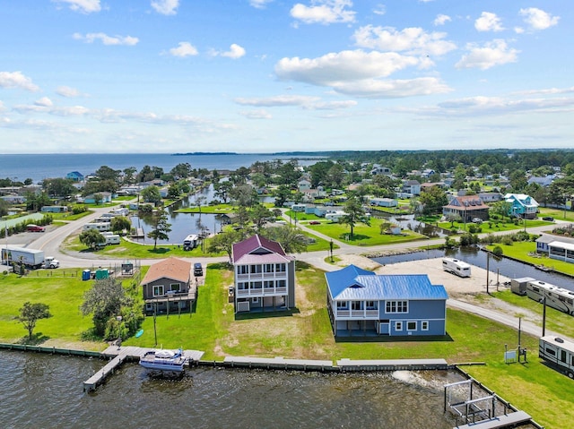 aerial view featuring a residential view and a water view