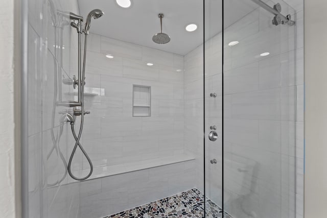 full bathroom with a shower stall