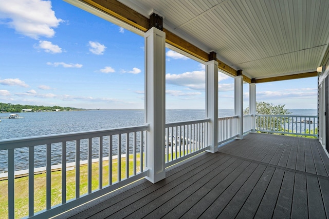 wooden terrace with a water view