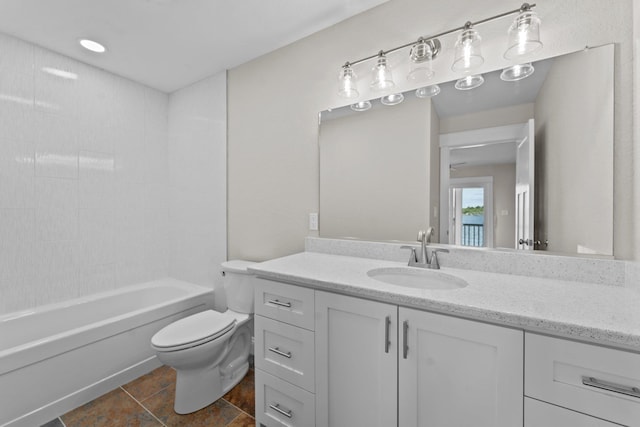 full bath featuring tub / shower combination, vanity, and toilet