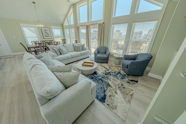 56738 NC-12 Hwy Lot 5, Hatteras, NC 27943 - living area featuring an inviting chandelier, baseboards, and wood finished floors