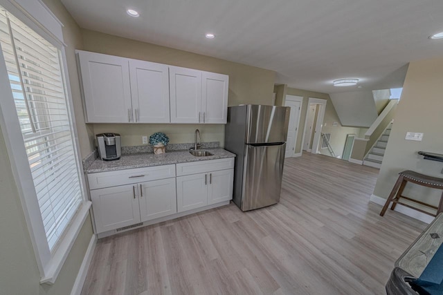 56738 NC-12 Hwy Lot 5, Hatteras, NC 27943 - kitchen featuring a sink, freestanding refrigerator, light wood-style flooring, and baseboards