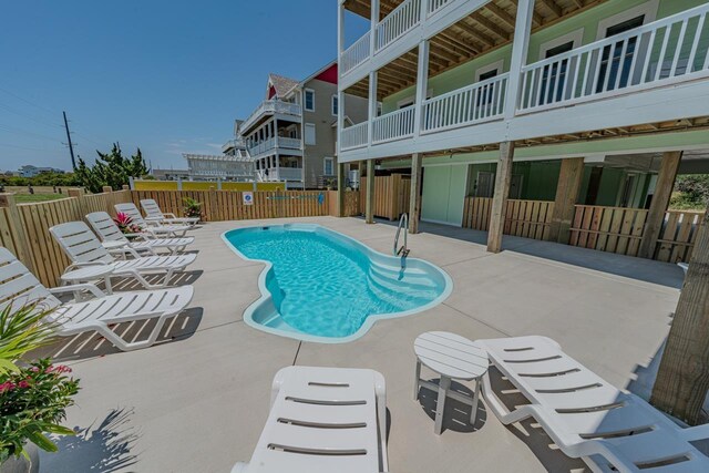 56738 NC-12 Hwy Lot 5, Hatteras, NC 27943 - community pool with a patio and fence