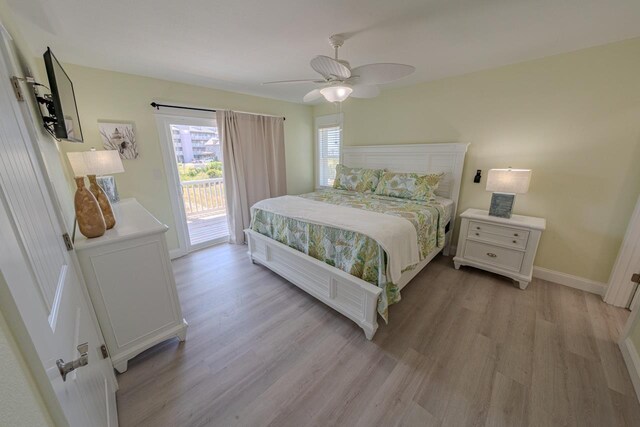 56738 NC-12 Hwy Lot 5, Hatteras, NC 27943 - bedroom featuring baseboards, access to outside, light wood-style flooring, and a ceiling fan