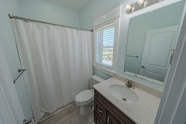 56738 NC-12 Hwy Lot 5, Hatteras, NC 27943 - bathroom featuring toilet, curtained shower, wood finished floors, and vanity