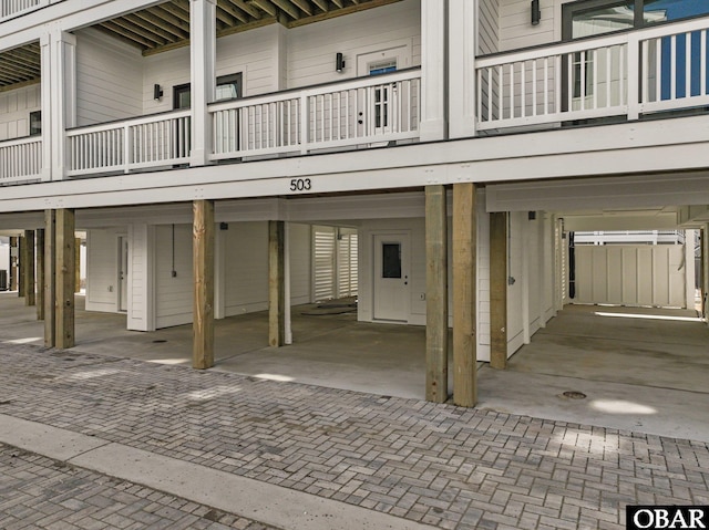 exterior space featuring a carport