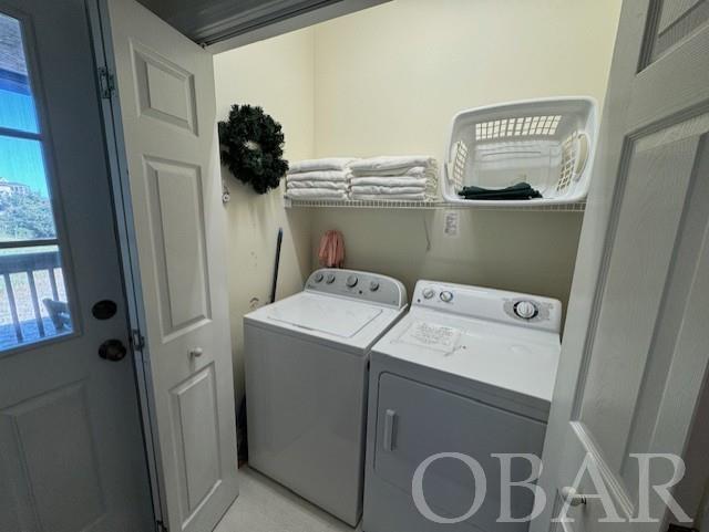 laundry area featuring washer and dryer and laundry area