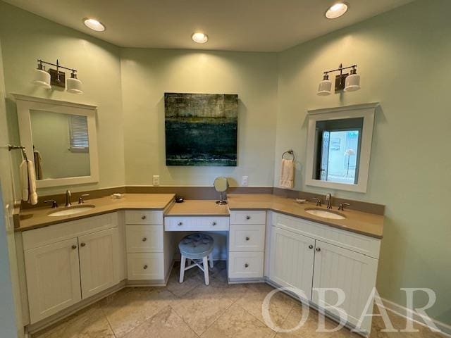 full bathroom with vanity and recessed lighting