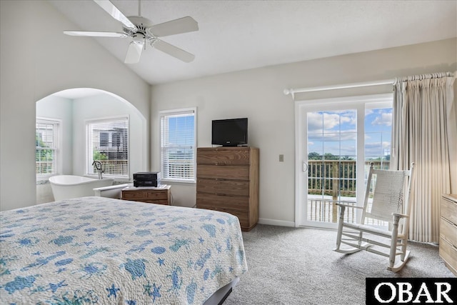 bedroom featuring light carpet, baseboards, a ceiling fan, lofted ceiling, and access to exterior