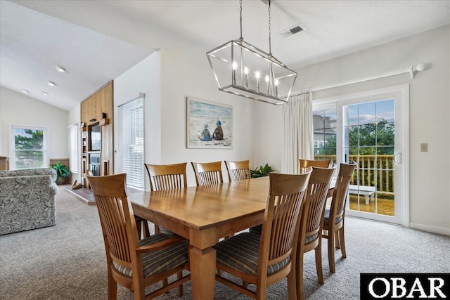 dining room with lofted ceiling, recessed lighting, visible vents, carpet, and an inviting chandelier