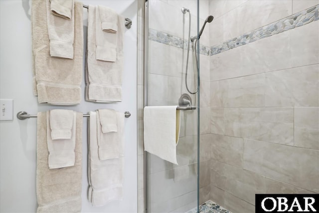 bathroom featuring a shower stall