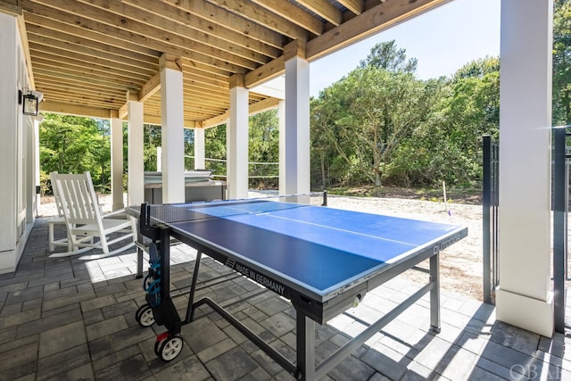 view of patio with a jacuzzi