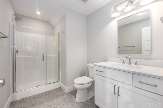 full bath with visible vents, baseboards, toilet, vanity, and a shower stall