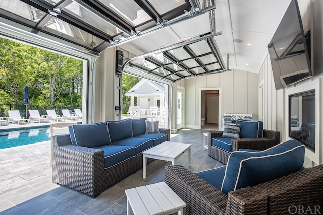 view of patio / terrace with an outdoor hangout area and a fenced in pool