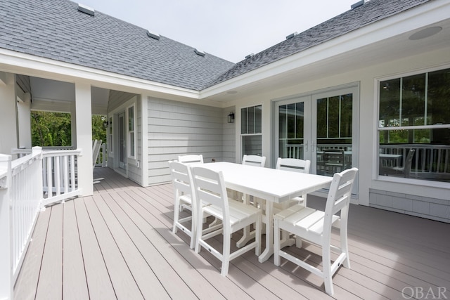 deck featuring outdoor dining area