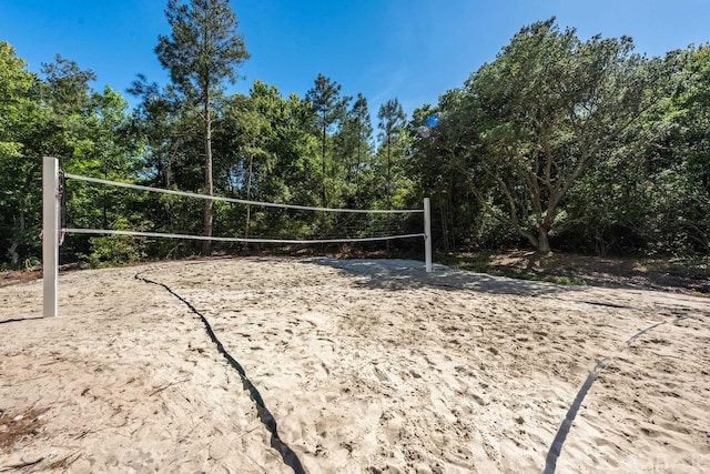 view of home's community featuring volleyball court