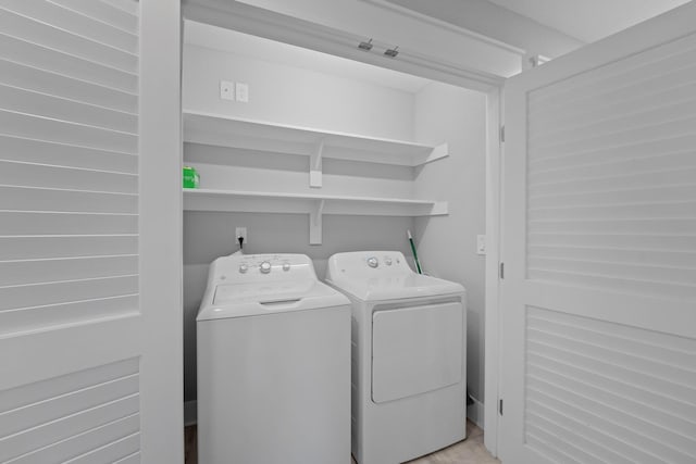 laundry room featuring laundry area and washer and dryer