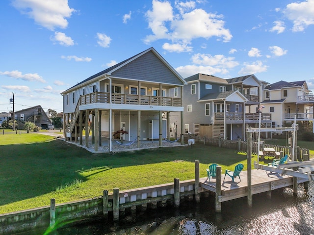 back of property featuring a yard, stairway, and a patio area